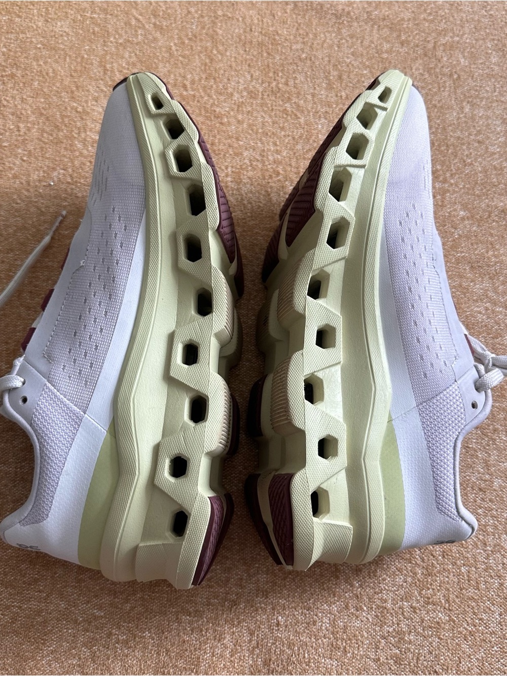 On Running Women's Running Shoes in White and Light Green with Plum Accents